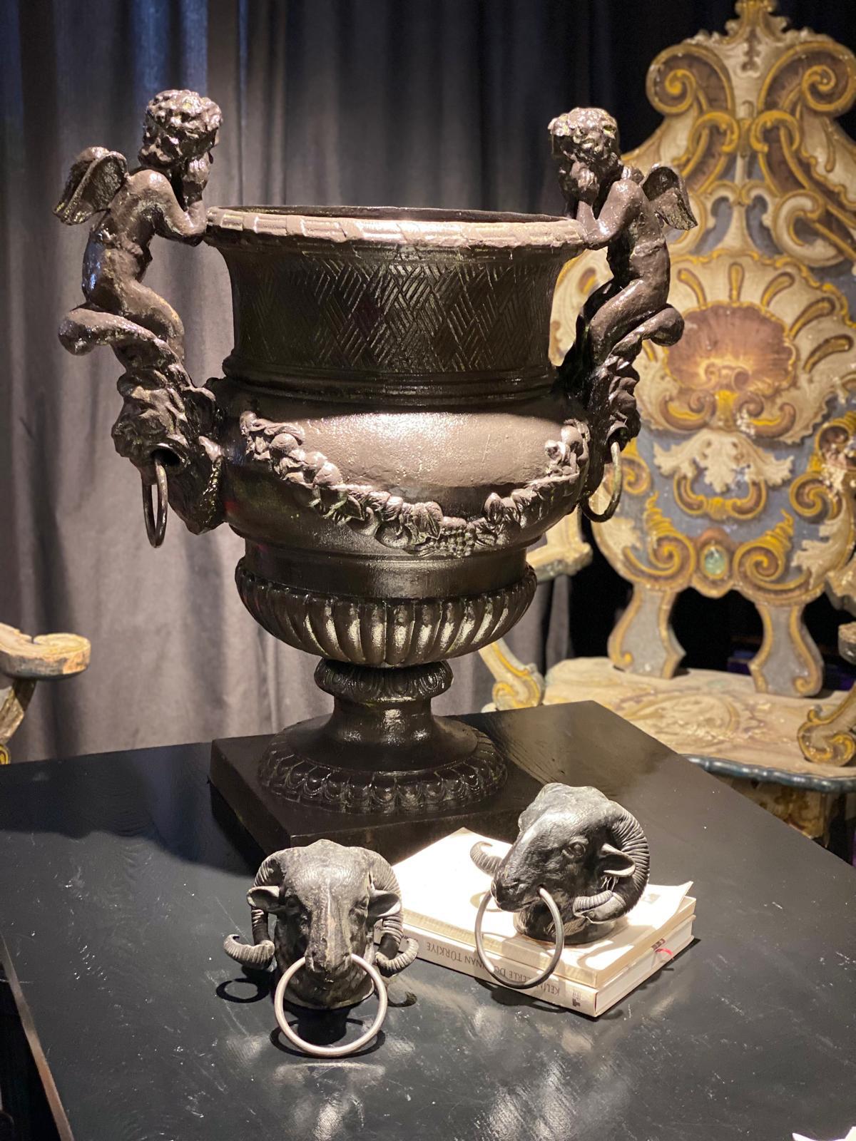 Cherub-Handled Cast Iron Urn